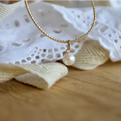 pendentif perle ronde et or 18 carats