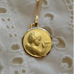 Medalla de bautismo El...