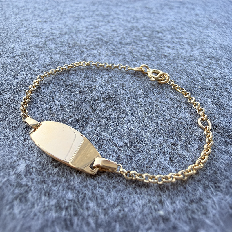 Gourmette bebé ovalada malla jaserón en Oro 18 Quilates