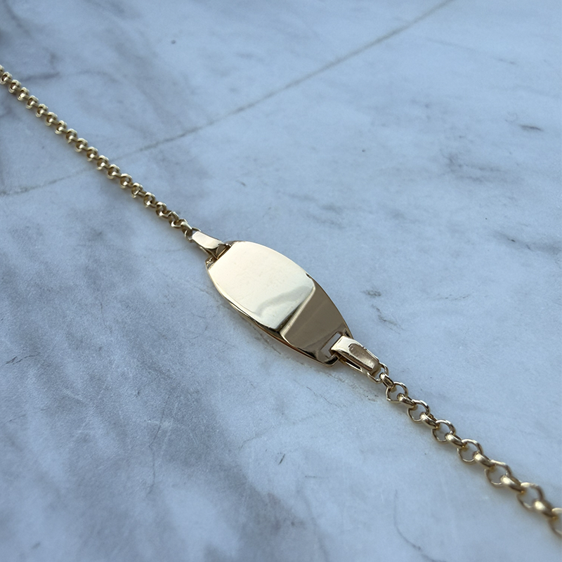 Gourmette bebé ovalada malla jaserón en Oro 18 Quilates