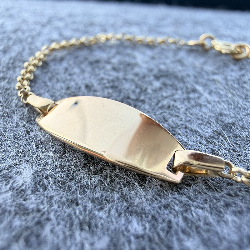 Gourmette bebé ovalada malla jaserón en Oro 18 Quilates